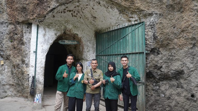 Filming crew at the entrance of Goa Belanda