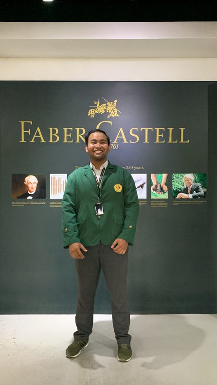 Dimas in front of the Faber-Castell heritage wall